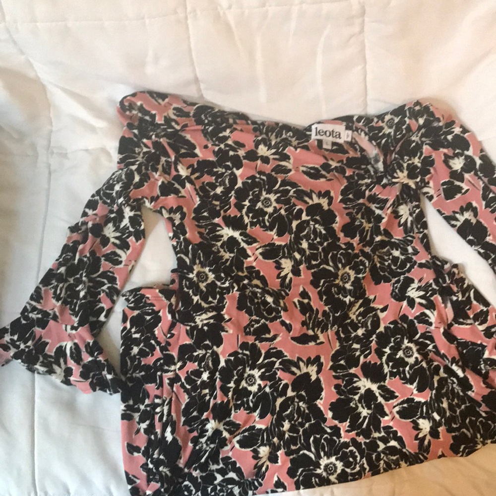 Floral mid length dress with matching belt.